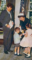 Mrs. Victor A. Prather Jr. with her children in the White House